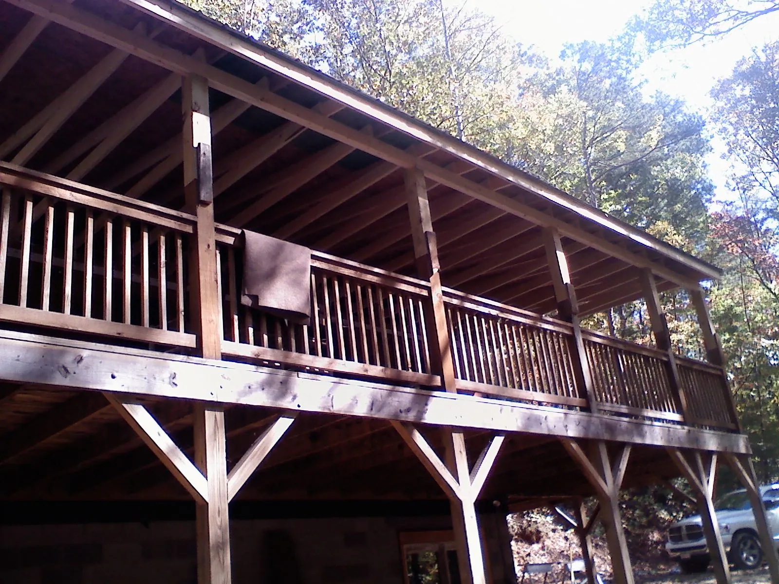 Timber framing under a new elevated porch and deck — Roof Leak Repair in Kinsman by Roofing Brothers